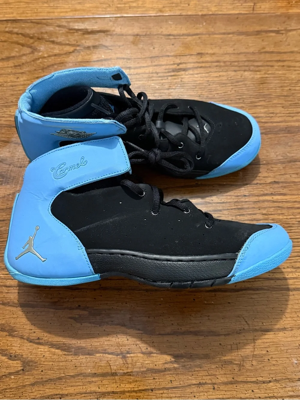 Kids Nike Melo 1.5 shoes black/university blue.
